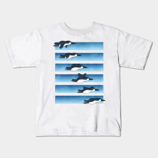 Flying penguin Kids T-Shirt